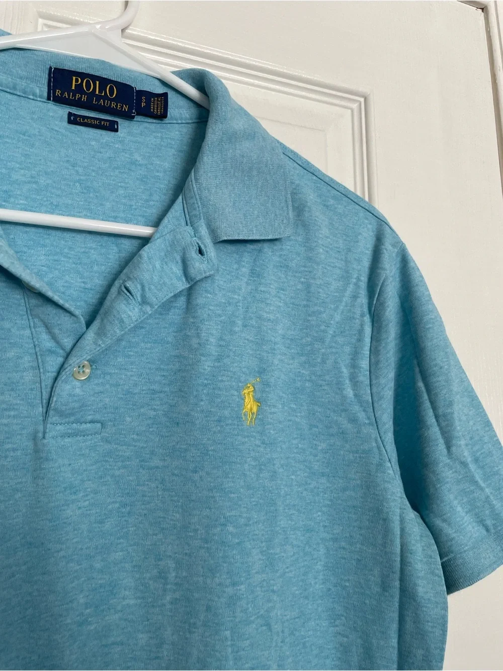 Polo by Ralph Lauren 100% Cotton Men’s size Small Light Blue Polo w Yellow Logo